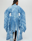 Akira Jacket Description - 100% cotton, knee length, flared sleeves front tie Color - Indigo arashi shibori dyed back view