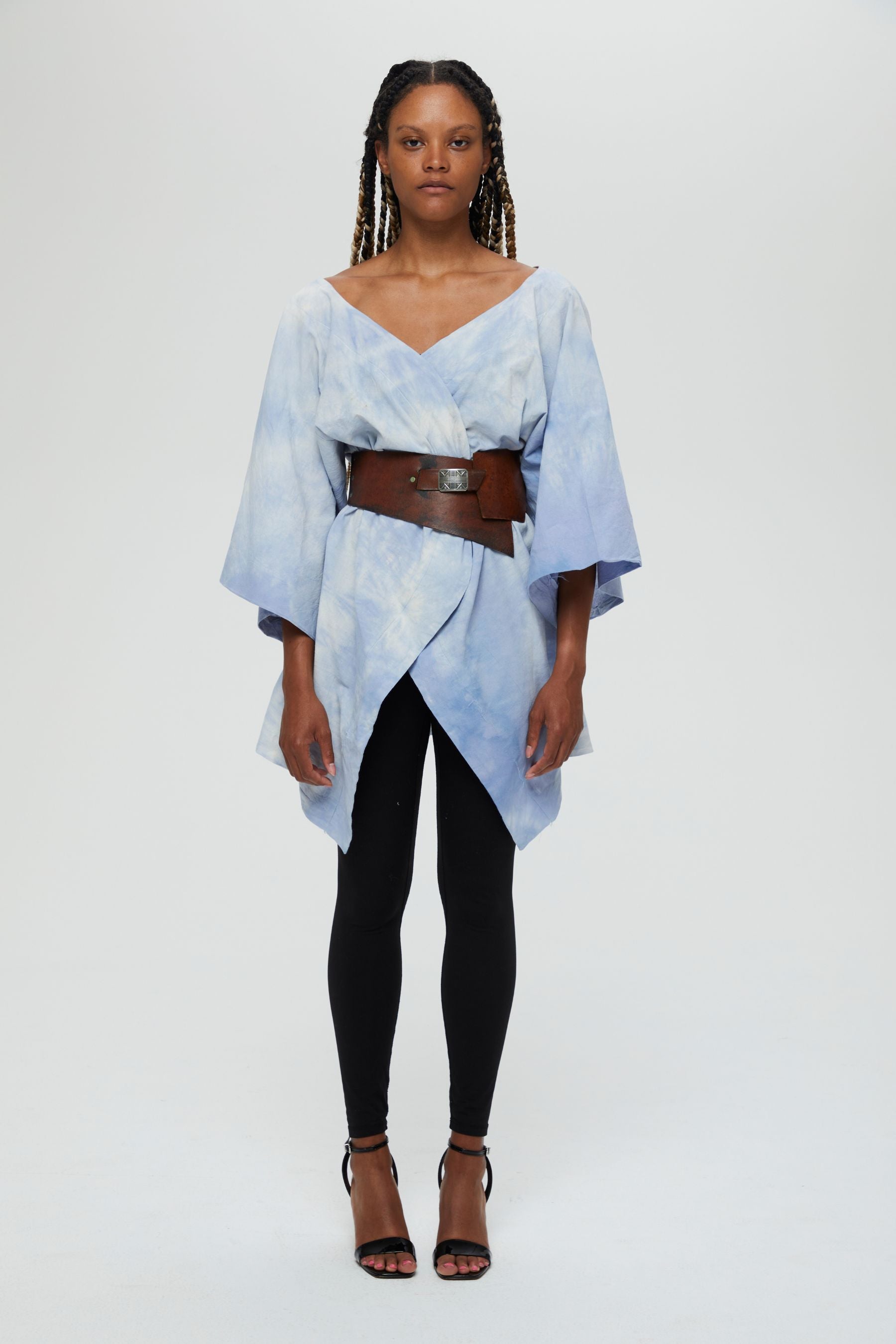 Ayano Jacket Description - 100% cotton, thigh length v-neck mid sleeve front wrap (belt sold under accessories) Color - indigo arashi shibori dyed front view