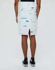 Clara 1 Skirt Description - 100% RECLÉM cotton peg skirt, knee length, back zipper, faced waist, bottom slit Color - white with blue (available in other color combinations) back view