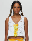 Clara 1 Top Description- 100% RECLÉM cotton, boxy high low, sleeveless v-neck Color - white with yellow accent front view