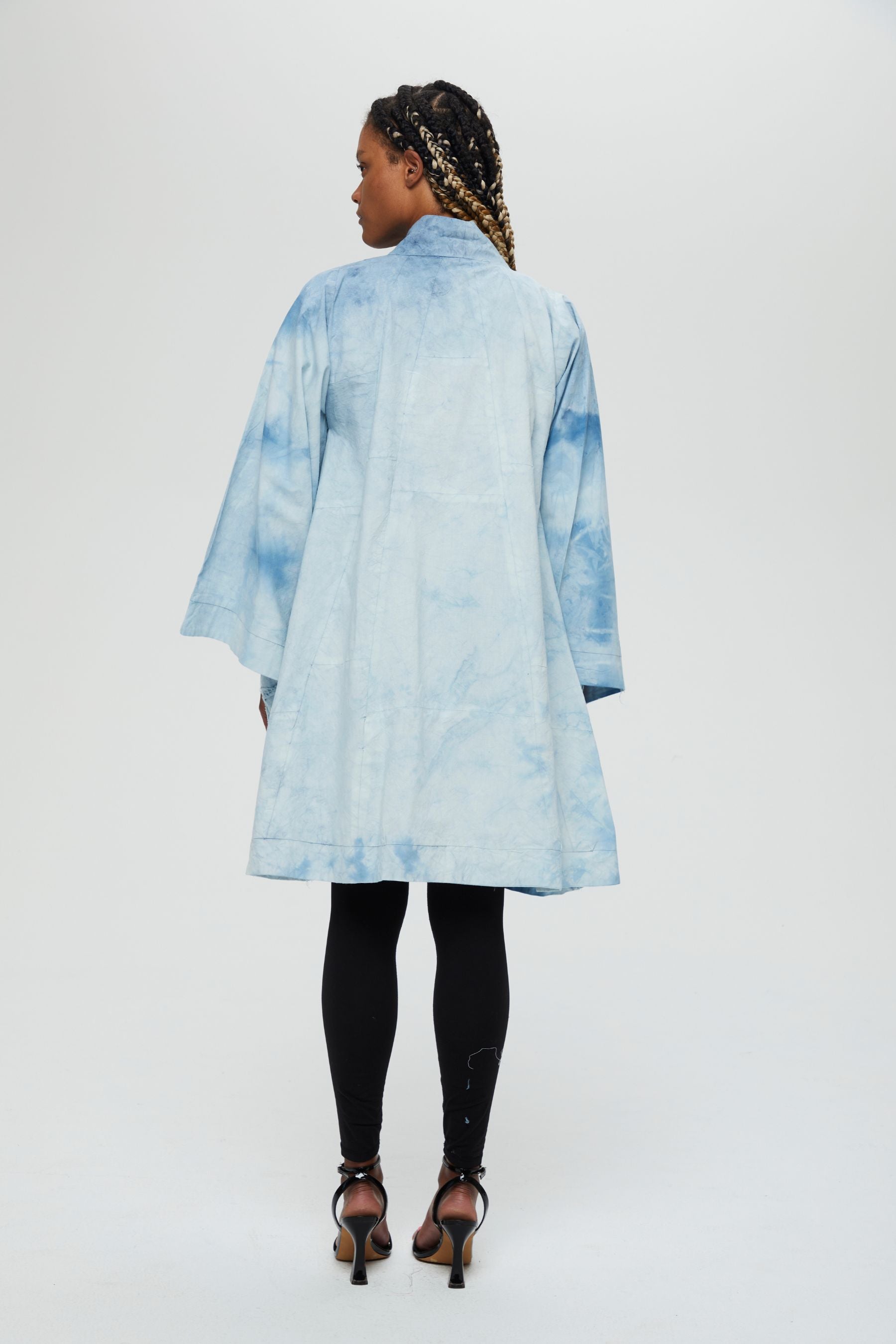 Aimi Jacket Description- 100% cotton jacket knee length drapes in front  Color - Indigo arashi shibori dyed back view