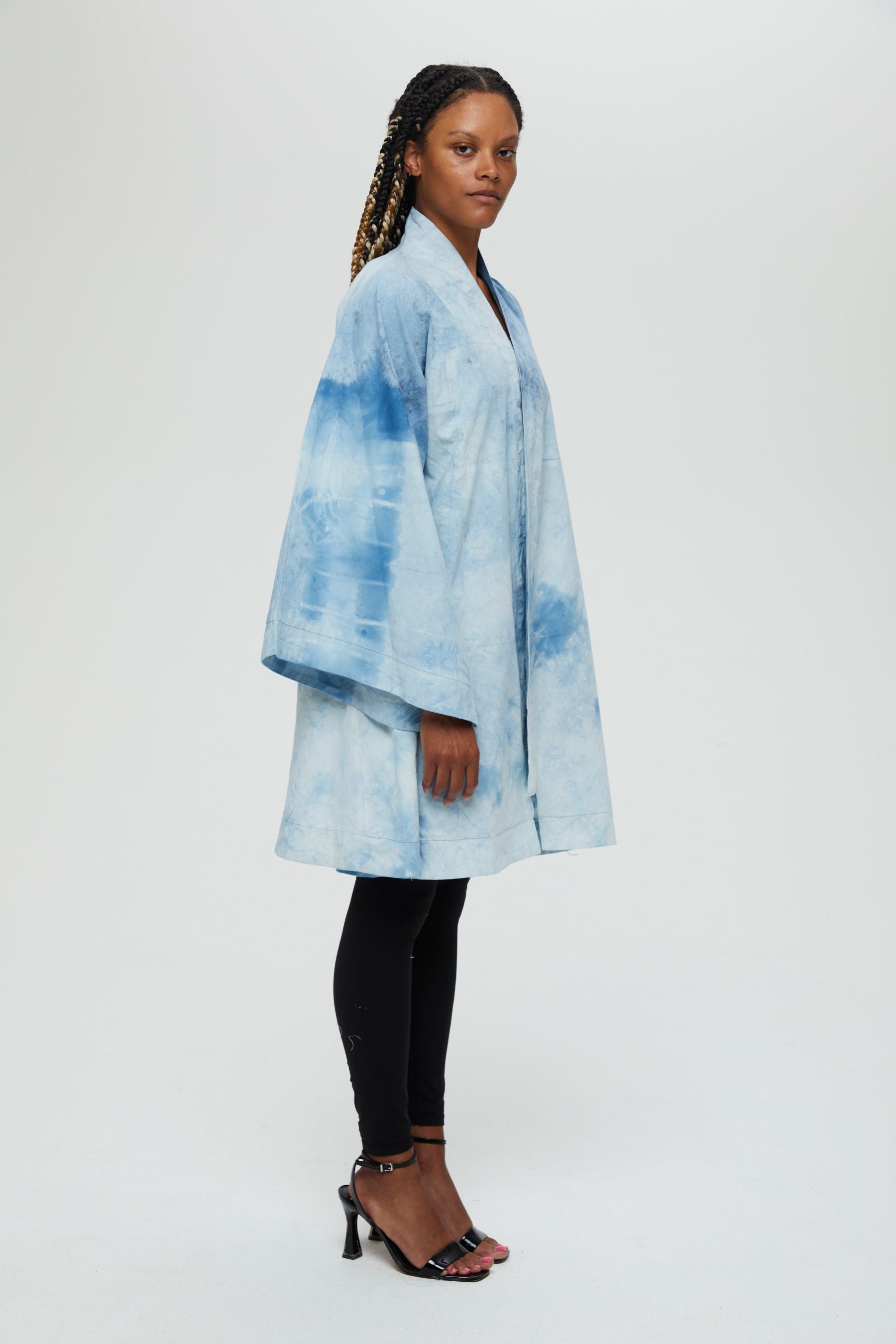 Aimi Jacket Description- 100% cotton jacket knee length drapes in front  Color - Indigo arashi shibori dyed side view