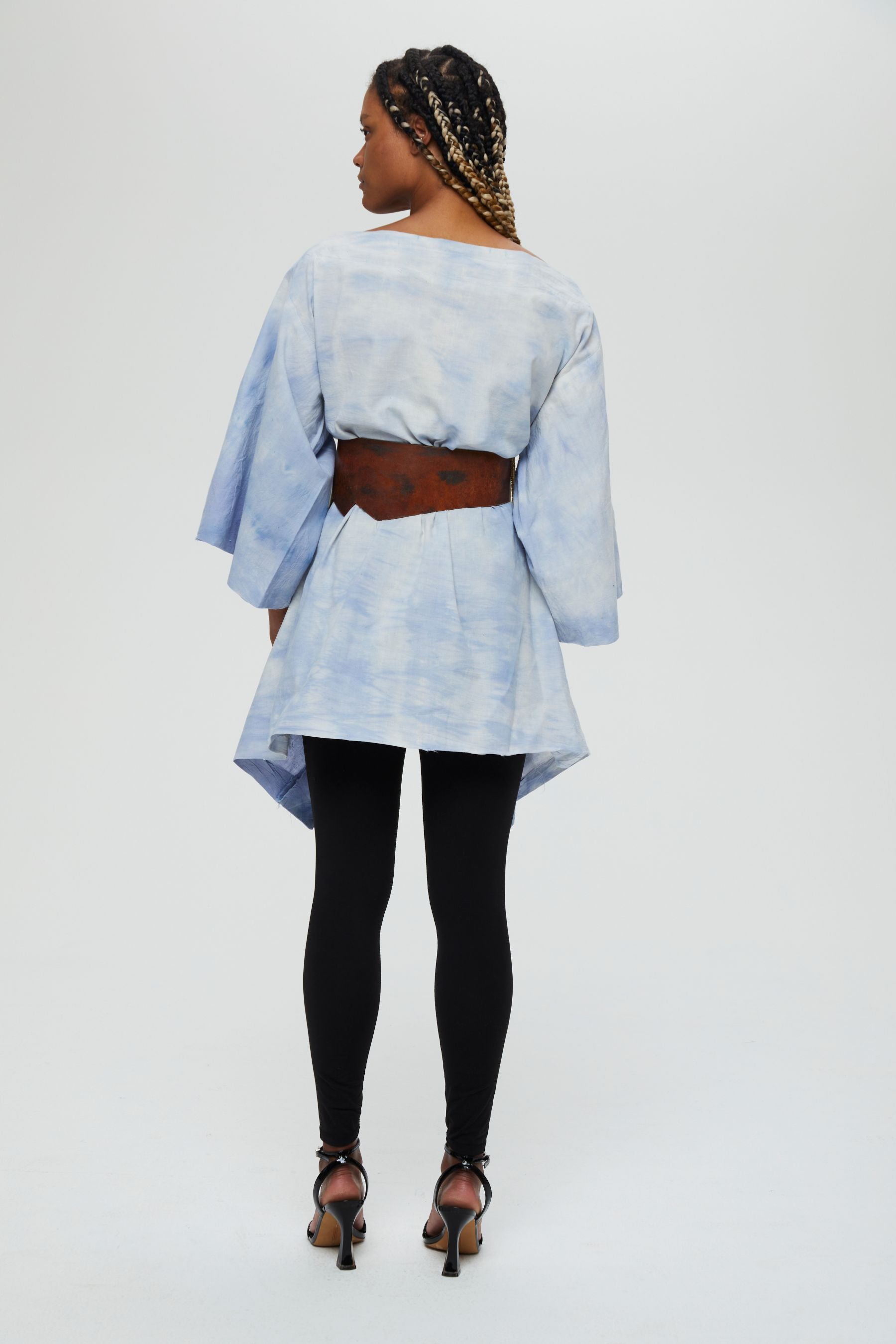 Ayano Jacket Description - 100% cotton, thigh length v-neck mid sleeve front wrap (belt sold under accessories)  Color - indigo arashi shibori dyed  front view