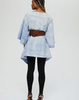 Ayano Jacket Description - 100% cotton, thigh length v-neck mid sleeve front wrap (belt sold under accessories)  Color - indigo arashi shibori dyed  front view