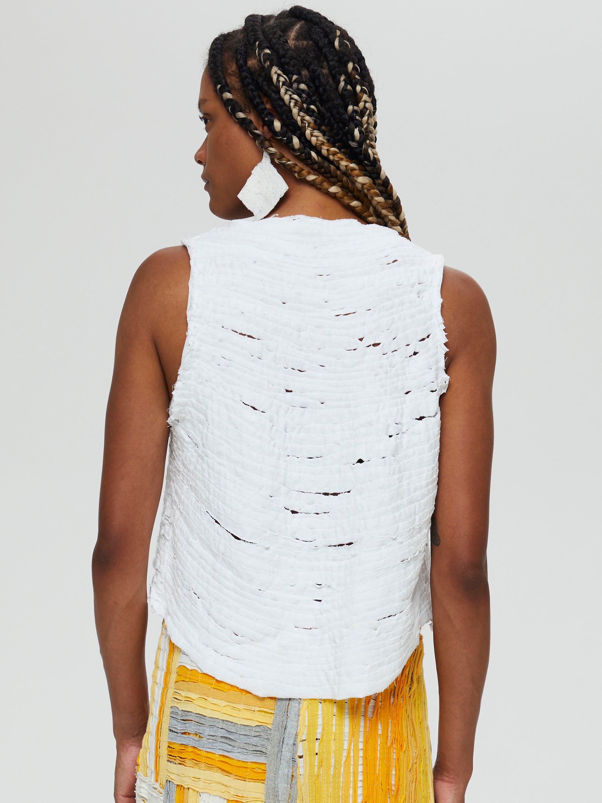 Clara 1 Top Description- 100%  RECLÉM cotton, boxy high low, sleeveless v-neck  Color - white with yellow accent back view