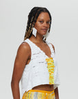 Clara 1 Top Description- 100%  RECLÉM cotton, boxy high low, sleeveless v-neck  Color - white with yellow accent side view