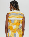 Clara 3 Vest Description - Vest 100%   RECLÉM cotton , boxy, sleeveless, tie front  Color - Yellow, grey and white back view