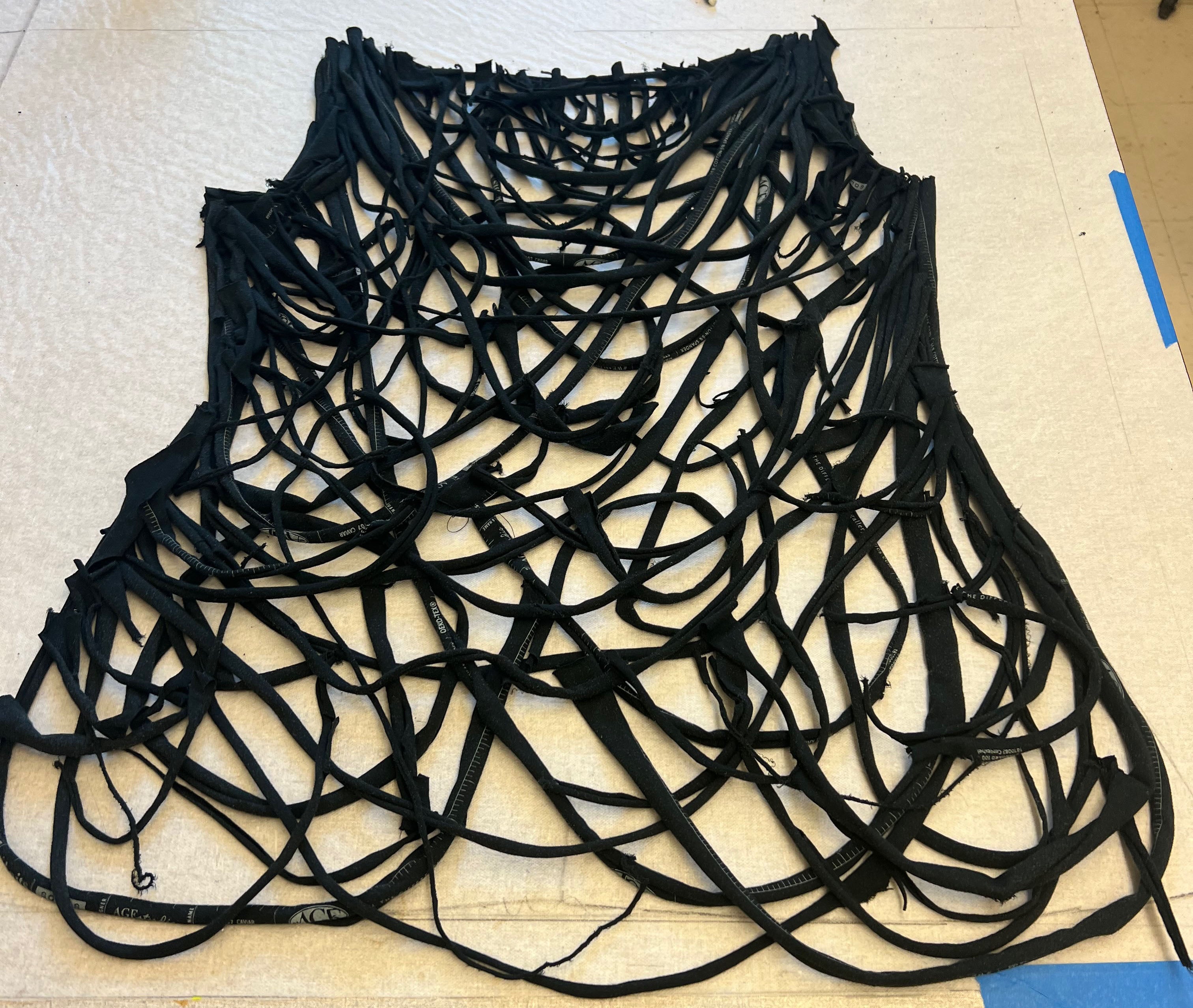 Close up of black top made of string in the Reclem Method