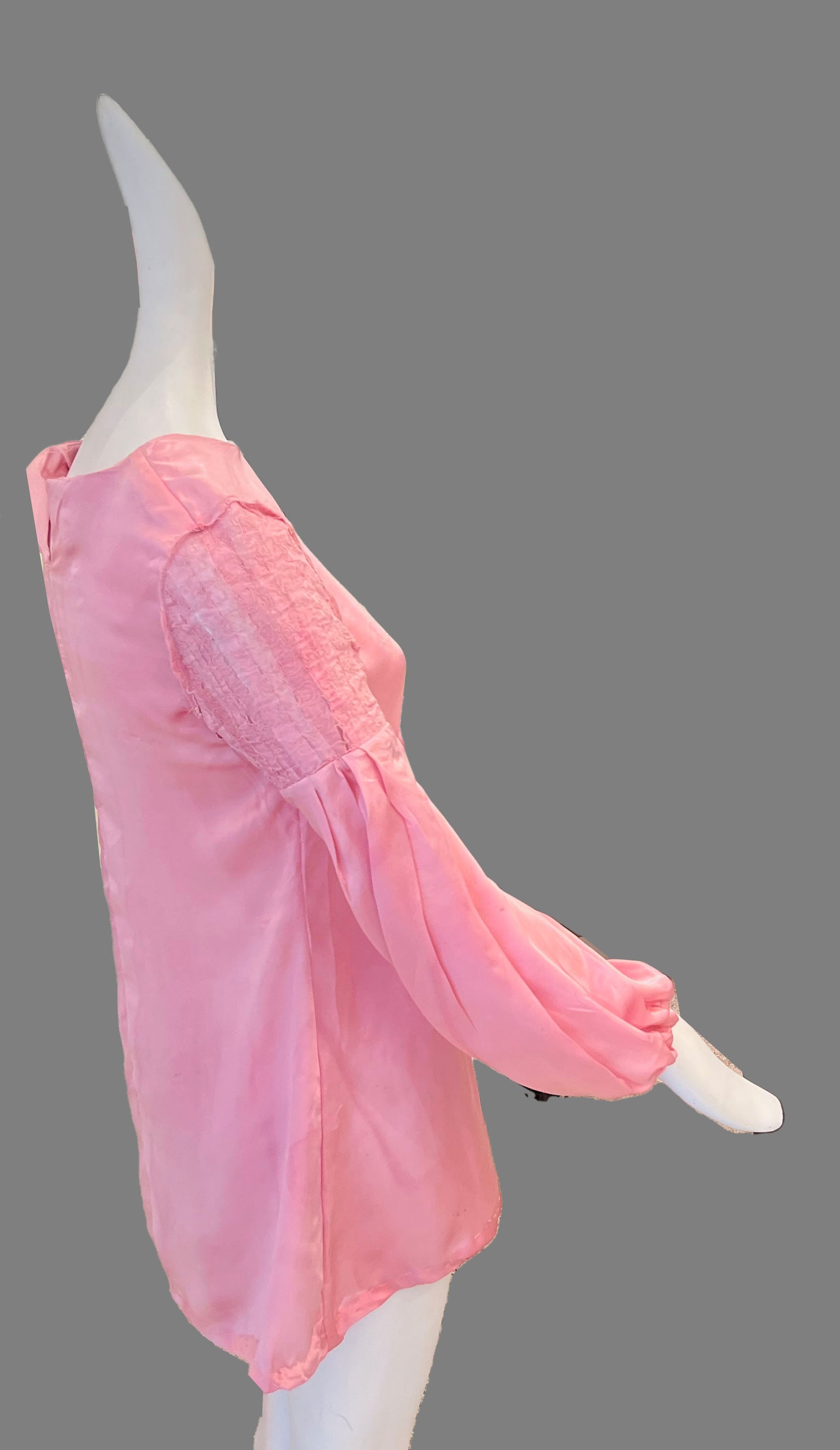 Pink reclem top on mannequin