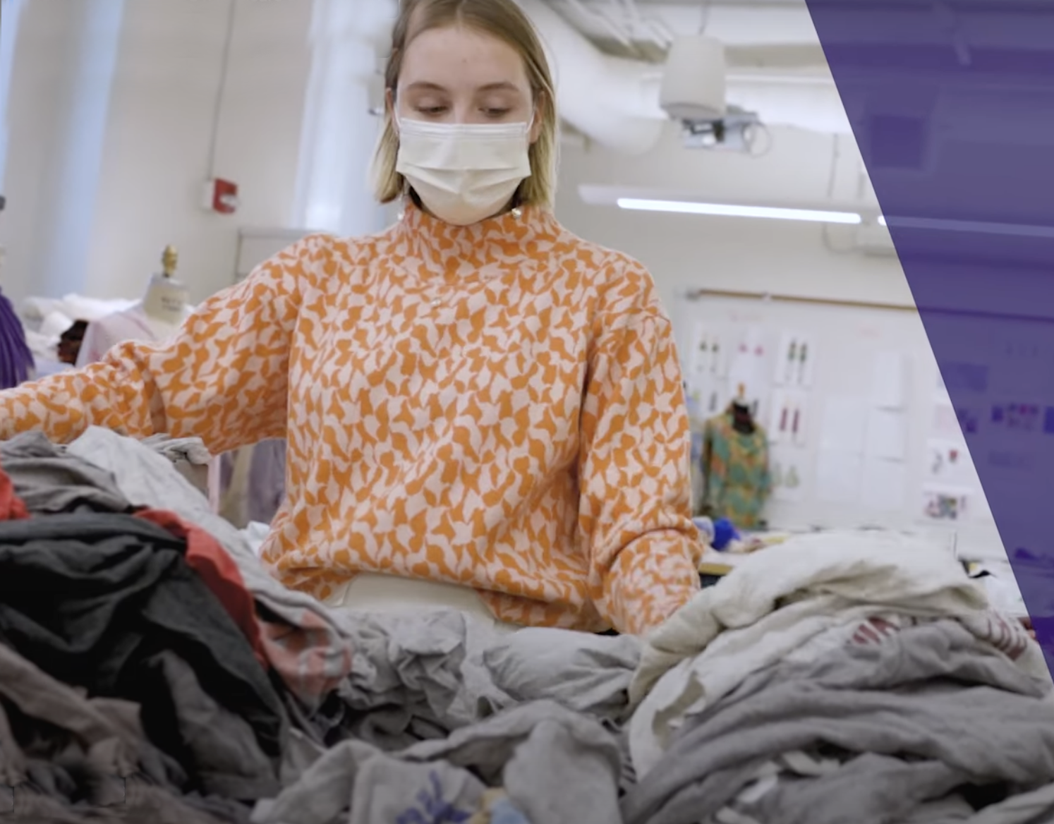 Woman sorting fabrics